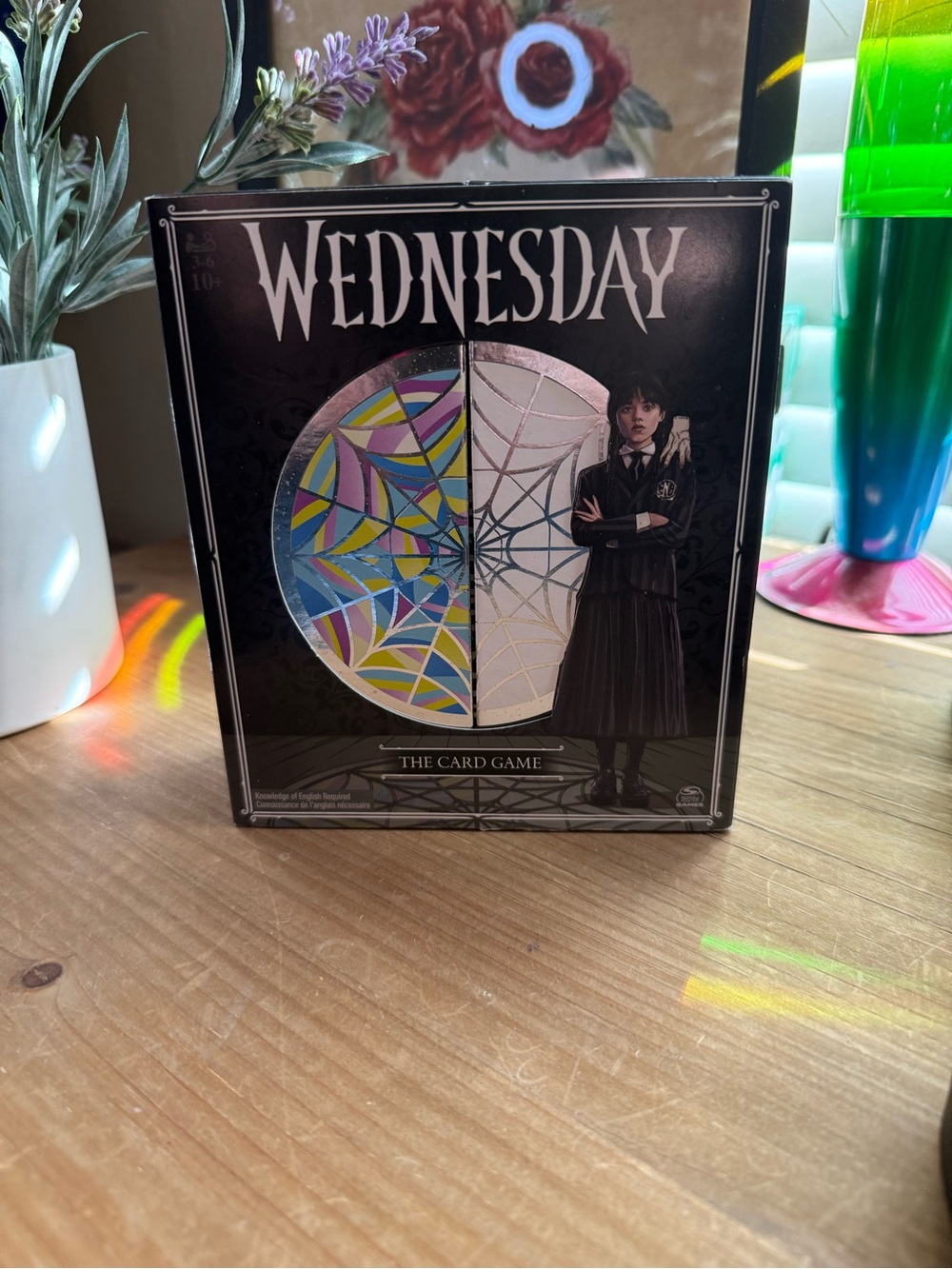 New Wednesday The Card Game - Black Box with Colorful Stained Glass Artwork